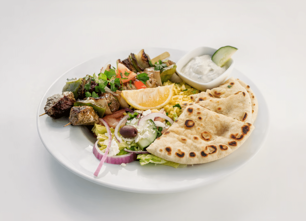 Grilled meat with vegetables and pita